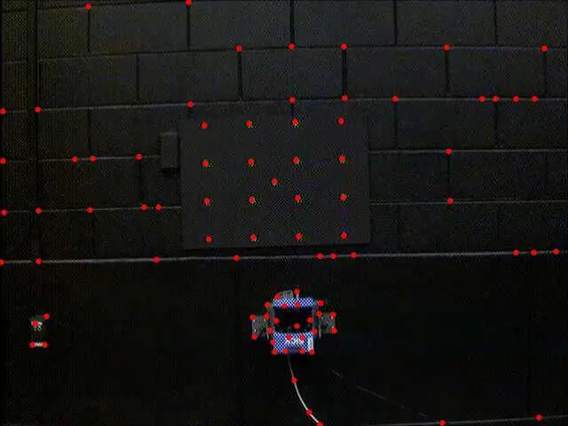 ratio:0.36 Feature tracking across frames, with matched features marked on the target and surrounding structure